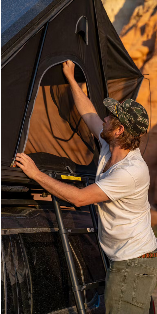 Easy setup roof top tent