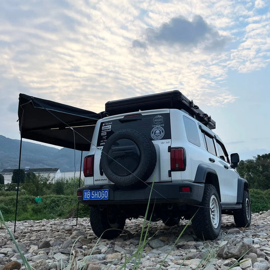 An image of a   Younghunter Camping 180 Degree Free Standing Fan tent SUV Car Side Awning With LED bars